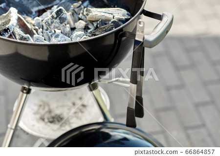 close up of charcoal smoldering in brazier close up of charcoal smoldering in brazier 66864857
