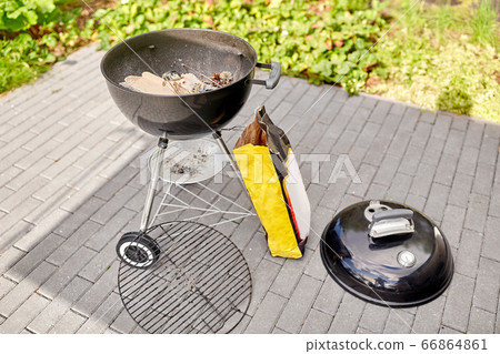 bbq grill brazier and bag of charcoal outdoors bbq grill brazier and bag of charcoal outdoors 66864861