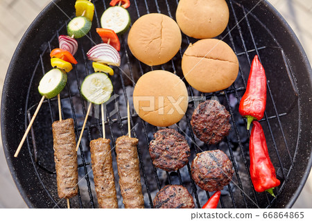 barbecue kebab meat and vegetables on grill barbecue kebab meat and vegetables on grill 66864865