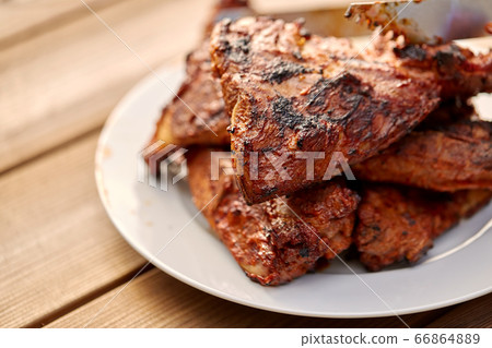 grilled barbecue meat stack on plate grilled barbecue meat stack on plate 66864889