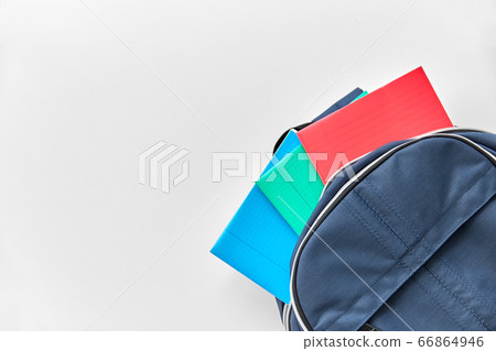 school backpack with notebooks on table school backpack with notebooks on table 66864946