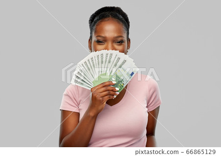 happy african american woman with euro money happy african american woman with euro money 66865129
