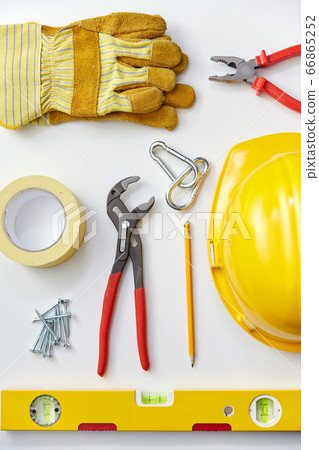 different work tools on white background 66865252