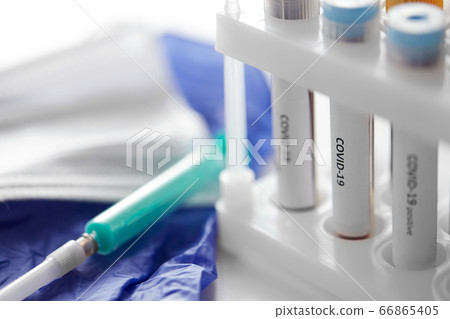 beakers with coronavirus blood test in holder beakers with coronavirus blood test in holder 66865405
