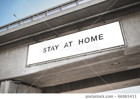 billboard with stay at home words on bridge billboard with stay at home words on bridge 66865431