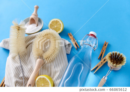 vinegar, lemons, soda, clothespins and brushes vinegar, lemons, soda, clothespins and brushes 66865612