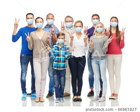 people in medical masks showing peace hand sign people in medical masks showing peace hand sign 66865827