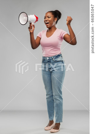 african american woman over grey background african american woman over grey background 66865847