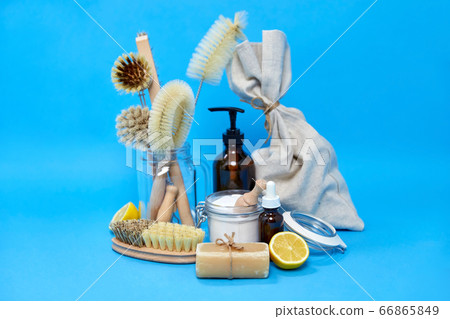 lemons, soap, washing soda, vinegar and brushes 66865849