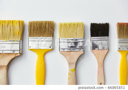 different size paint brushes on white background 66865851
