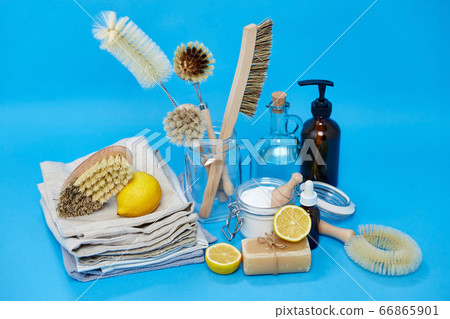 lemons, soap, washing soda, vinegar and brushes 66865901