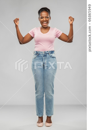 happy african american woman celebrating success happy african american woman celebrating success 66865949