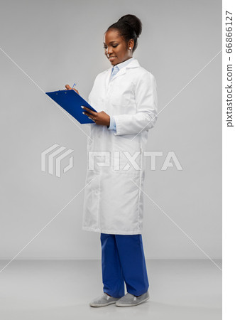 african american female doctor with clipboard african american female doctor with clipboard 66866127