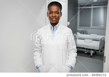 happy african american female doctor at hospital happy african american female doctor at hospital 66866232