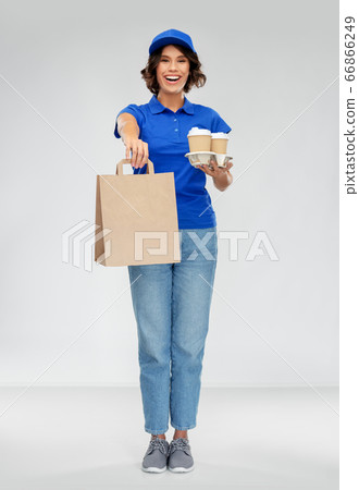delivery woman with coffee and food in paper bag delivery woman with coffee and food in paper bag 66866249