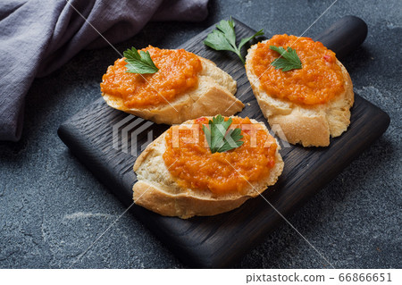 Sandwiches with bread zucchini caviar tomatoes onions. Homemade vegetarian food. Copy space. 66866651