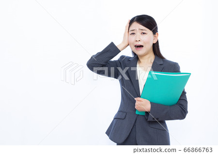 30's business woman holding a head 30's business woman holding a head 66866763