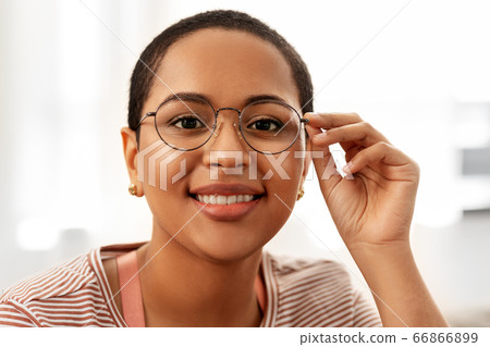 portrait of african american woman in glasses portrait of african american woman in glasses 66866899