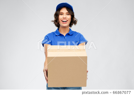 happy delivery girl with parcel box in blue happy delivery girl with parcel box in blue 66867077
