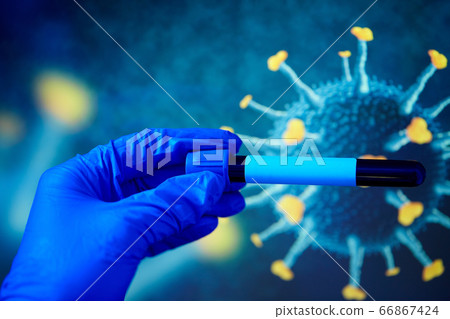 hand holding beaker with coronavirus blood test hand holding beaker with coronavirus blood test 66867424