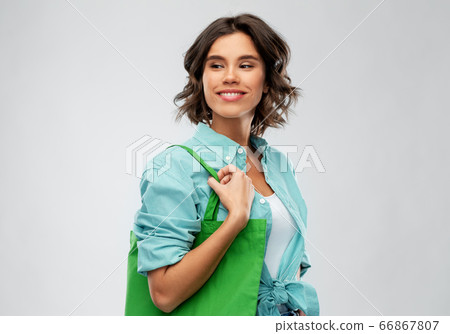 woman with reusable canvas bag for food shopping woman with reusable canvas bag for food shopping 66867807