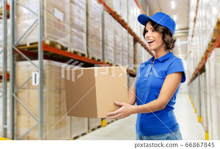 happy delivery girl with parcel box at warehouse happy delivery girl with parcel box at warehouse 66867845
