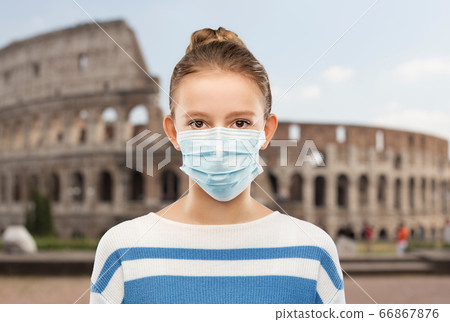 teenage girl in medical mask over coliseum, italy teenage girl in medical mask over coliseum, italy 66867876