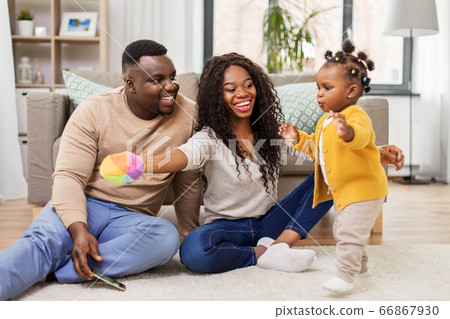 african family playing with baby daughter at home african family playing with baby daughter at home 66867930