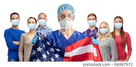 doctor in goggles and mask holding flag of america 66867972