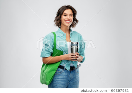 woman with bag for food shopping and tumbler woman with bag for food shopping and tumbler 66867981