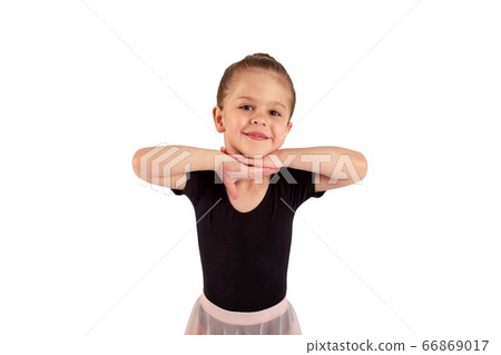 Portrait of cute little girl wearing dance suit, smiling and propping up her head with hands , isolated on white background Portrait of cute little girl wearing dance suit, smiling and propping up her head with hands , isolated on white background 66869017
