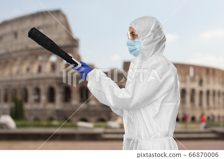 sanitation worker in hazmat with pressure washer sanitation worker in hazmat with pressure washer 66870006