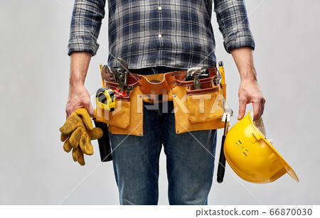 worker or builder with helmet and working tools worker or builder with helmet and working tools 66870030