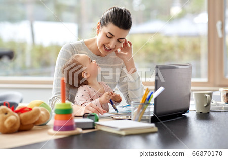 happy mother with baby working at home office happy mother with baby working at home office 66870170
