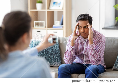 man and psychologist at psychotherapy session man and psychologist at psychotherapy session 66870427