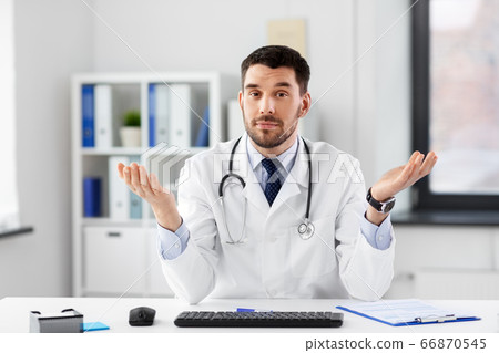 male doctor having video conference at hospital 66870545