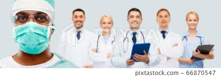 close up of indian surgeon in mask and doctors close up of indian surgeon in mask and doctors 66870547