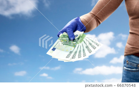 close up of hand in medical glove with money close up of hand in medical glove with money 66870548