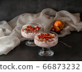 A dessert of yogurt and fruit in glass glasses 66873232