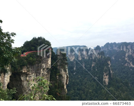 Rocky natural bridge and mountain cliffs at Zhangjiajie national park, Wulingyuan, Hunan, China 66873463