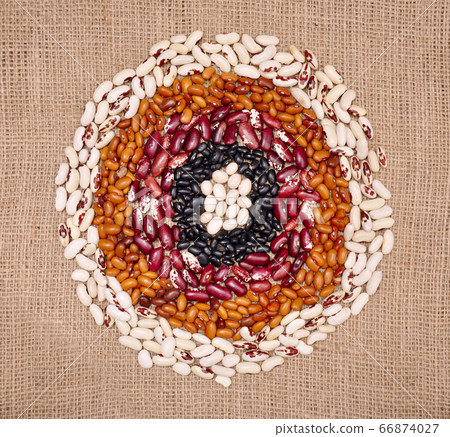Colored beans. Variations and food circles on sack cloth 66874027