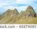 Breathtaking landscape in Carpathian mountains. With high green hills and rocks 66874085