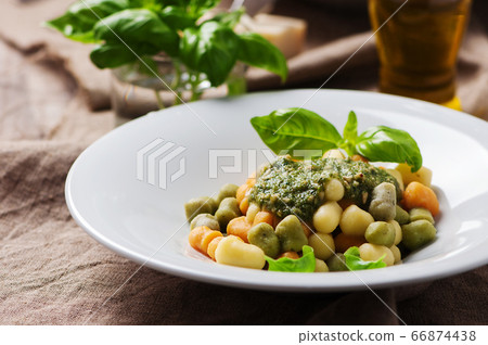 Colored gnocchi with pesto Colored gnocchi with pesto 66874438