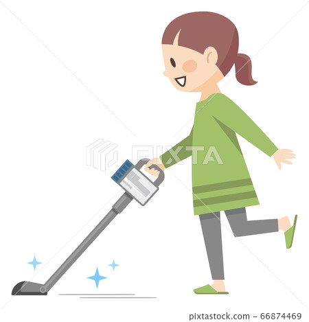 Young woman vacuuming a cordless 66874469