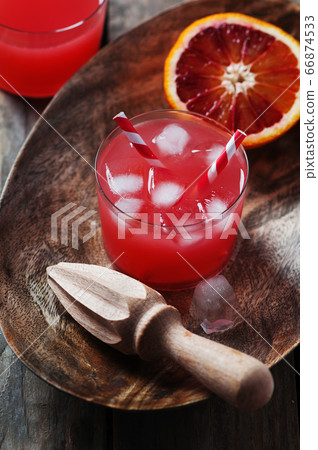 Fresh red orange juice in a glass 66874533