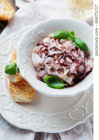 Octopus carpaccio in the table Octopus carpaccio in the table 66875217