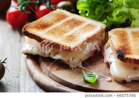 Toas with ham and cheese Toas with ham and cheese 66875398
