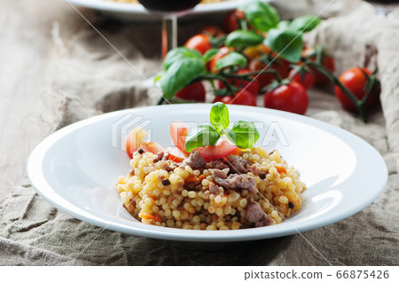 Cooked sardinain pasta fregola with tomato and Cooked sardinain pasta fregola with tomato and 66875426