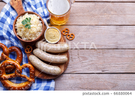 Oktoberfest party dinner with traditional dishes Oktoberfest party dinner with traditional dishes 66880064