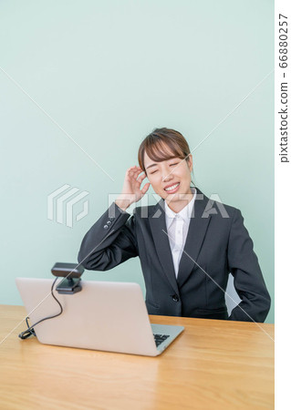 A young woman interviewing online using a webcam [Failure in job hunting] 66880257
